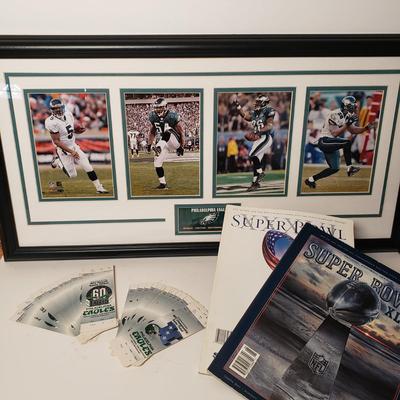 LOT. 195: Vintage Eagles Season Pass Tickets, Framed Eagles Players Decor & More