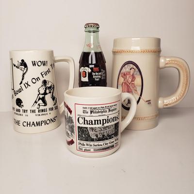 LOT 196: Philadelphia Sports Memorabilia with NFL Super Bowl Football, Mugs, Action Figures & More