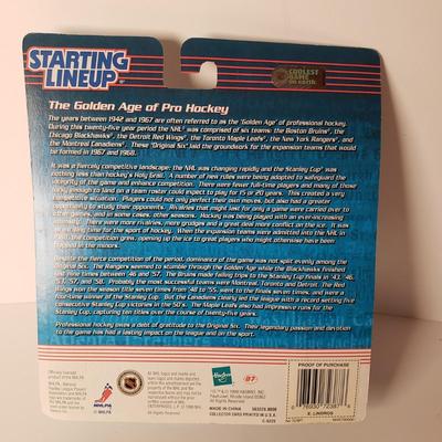 LOT 196: Philadelphia Sports Memorabilia with NFL Super Bowl Football, Mugs, Action Figures & More