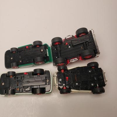 LOT 199: Hess Trucks Emergency Vehicles, Rescue Truck, SUV & Racecar Collection