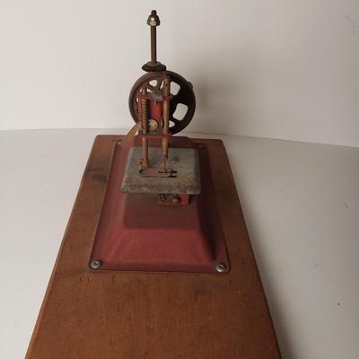 LOT 208: Vintage Miniature Toy Sewing Machine