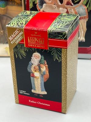 LOT 48: Hallmark Christmas Santa Claus Ornaments