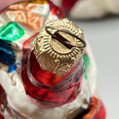 LOT 53: Vintage Holiday Decorations- featuring a Wallace Silversmiths annual silver-plated sleigh bell ornament