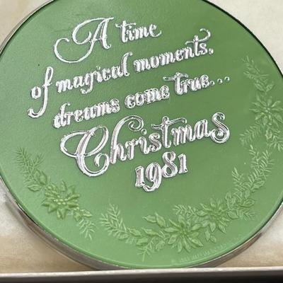 LOT 53: Vintage Holiday Decorations- featuring a Wallace Silversmiths annual silver-plated sleigh bell ornament