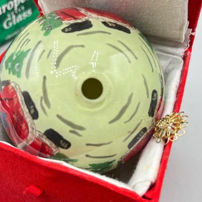 LOT 53: Vintage Holiday Decorations- featuring a Wallace Silversmiths annual silver-plated sleigh bell ornament