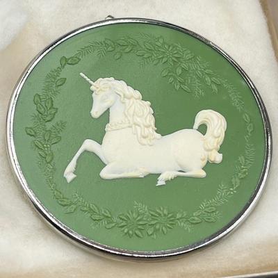 LOT 53: Vintage Holiday Decorations- featuring a Wallace Silversmiths annual silver-plated sleigh bell ornament