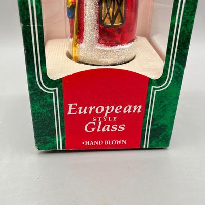 LOT 53: Vintage Holiday Decorations- featuring a Wallace Silversmiths annual silver-plated sleigh bell ornament