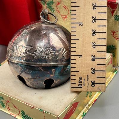 LOT 53: Vintage Holiday Decorations- featuring a Wallace Silversmiths annual silver-plated sleigh bell ornament