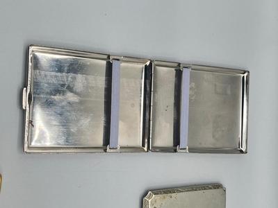 LOT 185: Vintage Cigarette Cases and Zippo Lighters