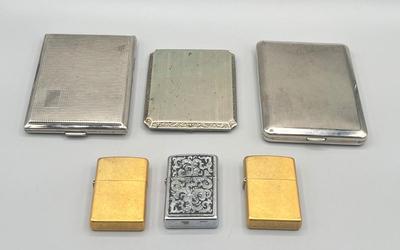 LOT 185: Vintage Cigarette Cases and Zippo Lighters