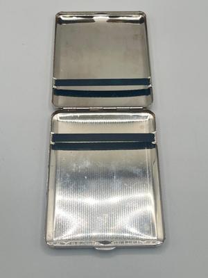 LOT 185: Vintage Cigarette Cases and Zippo Lighters