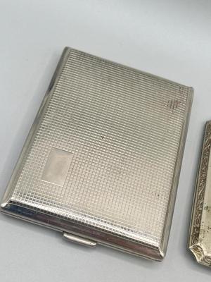 LOT 185: Vintage Cigarette Cases and Zippo Lighters