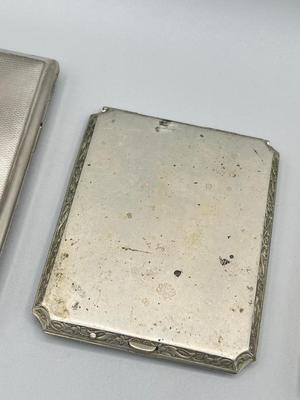 LOT 185: Vintage Cigarette Cases and Zippo Lighters