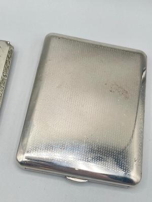 LOT 185: Vintage Cigarette Cases and Zippo Lighters