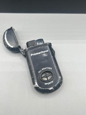 LOT 189: Cigar Afficianado Collection - Humidor, Zippo and Proetheus Lighters, Faux Mable Cigar Lighter With Ashtray and More