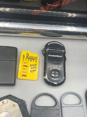 LOT 189: Cigar Afficianado Collection - Humidor, Zippo and Proetheus Lighters, Faux Mable Cigar Lighter With Ashtray and More