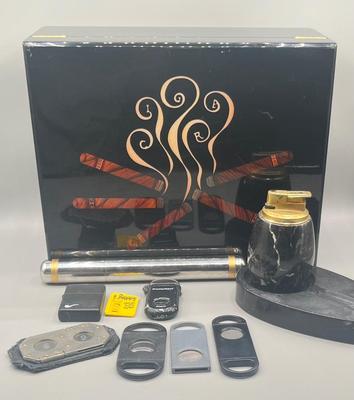 LOT 189: Cigar Afficianado Collection - Humidor, Zippo and Proetheus Lighters, Faux Mable Cigar Lighter With Ashtray and More