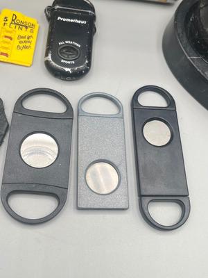 LOT 189: Cigar Afficianado Collection - Humidor, Zippo and Proetheus Lighters, Faux Mable Cigar Lighter With Ashtray and More