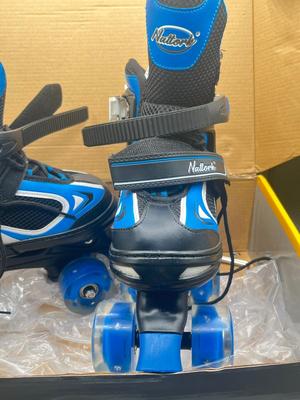 LOT 191: New In Box Kid's Adjustable Size Nattork Rollerskates - Fit Sizes 35-38 (USA Sizes 3.5-6)