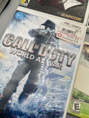 LOT 192: Wii Games - Batman, Spiderman, Madden '09, Beatles Rockband, Call of Duty and More