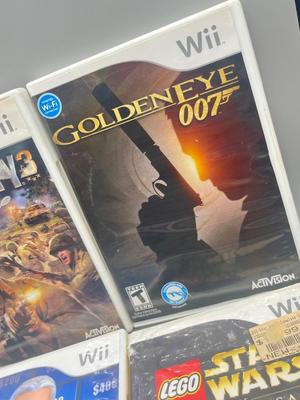 LOT 192: Wii Games - Batman, Spiderman, Madden '09, Beatles Rockband, Call of Duty and More