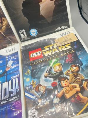 LOT 192: Wii Games - Batman, Spiderman, Madden '09, Beatles Rockband, Call of Duty and More