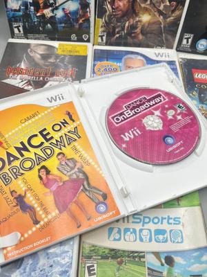LOT 192: Wii Games - Batman, Spiderman, Madden '09, Beatles Rockband, Call of Duty and More
