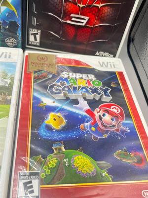 LOT 192: Wii Games - Batman, Spiderman, Madden '09, Beatles Rockband, Call of Duty and More