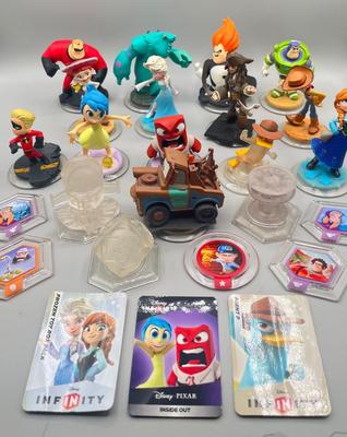 LOT 196: Disney Infinity Figures and Accessories - Toy Story, Incredibles, Frozen and More