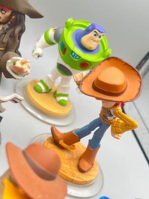 LOT 196: Disney Infinity Figures and Accessories - Toy Story, Incredibles, Frozen and More