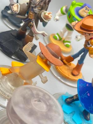 LOT 196: Disney Infinity Figures and Accessories - Toy Story, Incredibles, Frozen and More