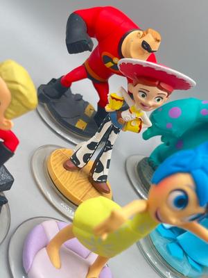 LOT 196: Disney Infinity Figures and Accessories - Toy Story, Incredibles, Frozen and More