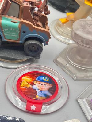 LOT 196: Disney Infinity Figures and Accessories - Toy Story, Incredibles, Frozen and More