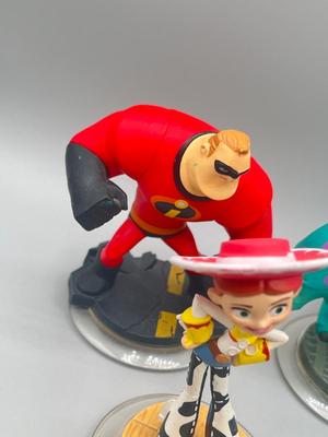 LOT 196: Disney Infinity Figures and Accessories - Toy Story, Incredibles, Frozen and More
