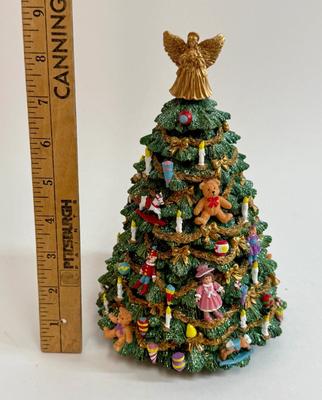 Sale Photo Thumbnail #371: Very good physical condition, but music box doesn't play. Approx. 8.5" tall.