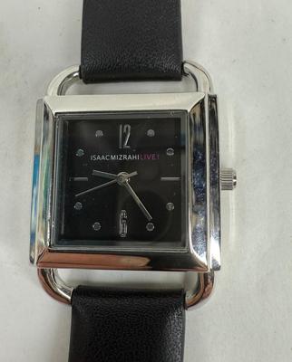 Sale Photo Thumbnail #381: Square black watch face, bright silver rim. Black Leather strap. Hands can be adjusted, but watch isn't running, most likely needs a new battery.  Looks to be new and unworn.