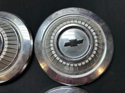 4 MATCHING VINTAGE CHEVROLET HUBCAPS