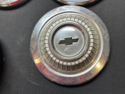 4 MATCHING VINTAGE CHEVROLET HUBCAPS