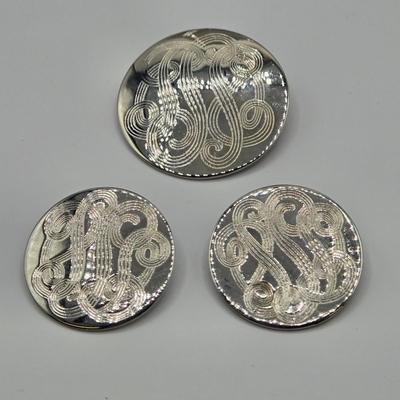 LOT 411: Multiple Pairs of Clip Earrings, Brooches, Silver-tone Chain with Winter Charms, and More