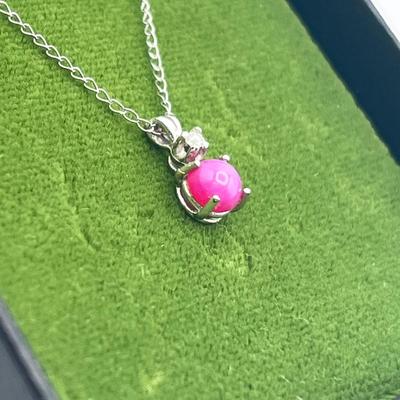 LOT 419: 14K White Gold Pink Cat's Eye and Diamond Pendant on 17" Necklace - 1.2 GTW