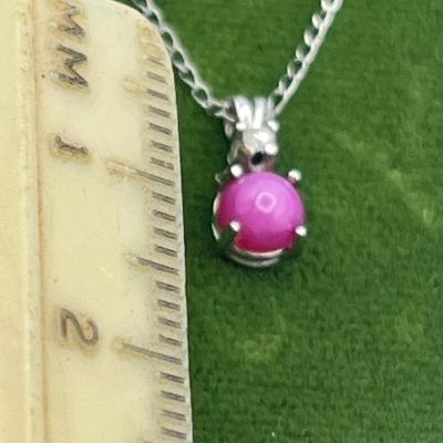 LOT 419: 14K White Gold Pink Cat's Eye and Diamond Pendant on 17" Necklace - 1.2 GTW