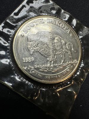 1989 SOUTH DAKOTA 1 OUNCE .999 FINE SILVER ROUND