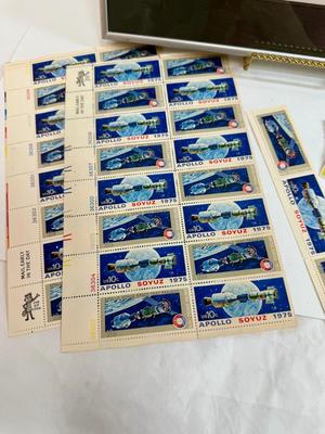 Sale Photo Thumbnail #477: Framed color photo, Apollo-Soyuz Stamps, and more.