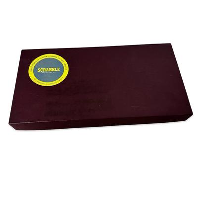 Sale Photo Thumbnail #691: Vintage Scrabble Game in Box- appears unused except the bag of tiles has been opened. Tiles have not been counted.