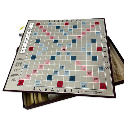 Sale Photo Thumbnail #692: Vintage Scrabble Game in Box- appears unused except the bag of tiles has been opened. Tiles have not been counted.