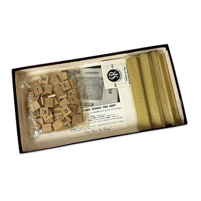 Sale Photo Thumbnail #693: Vintage Scrabble Game in Box- appears unused except the bag of tiles has been opened. Tiles have not been counted.