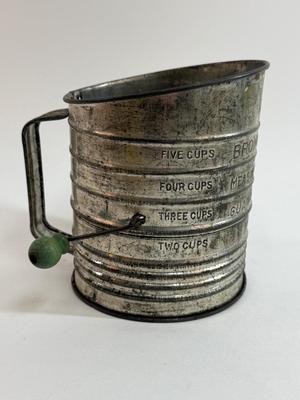 Sale Photo Thumbnail #105: All-metal construction, holds up to 5 cups. A little surface corrosion, but otherwise in good condition.