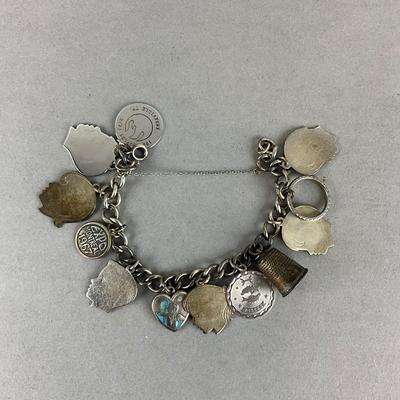 S818 Vintage Sterling Silver Charm Bracelet with Several Charms