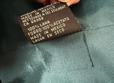 Sale Photo Thumbnail #266: 100% wool, dry clean only. In very good used condition.