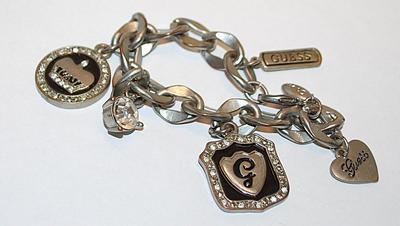 "GUESS" Brand Silver Tone BRACELET (3" Opening) with Solid Links, Assorted CHARMS and Lobster Clasp